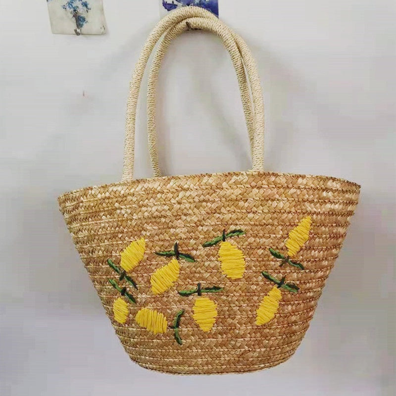Handwoven Rattan Tote with Vibrant Lemon & Mango Embroidery – Perfect Blend of Nature & Style for Summer Days!